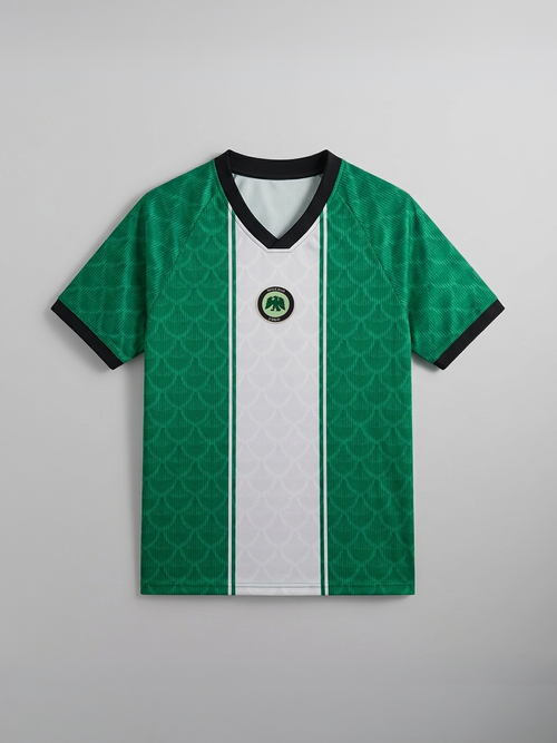 Green and white sports jersey with a logo on a gray background